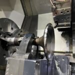 Machining process during 2-stroke exhaust valve reconditioning at KIMI’s precision workshop.
