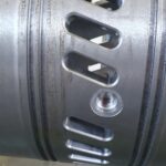 Precision machining of scavenging air ports on 2-stroke cylinder liner during manufacturing at KIMI’s CNC workshop.