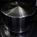 Fully reconditioned 2-stroke piston crown and grooves after robotic welding and CNC machining at KIMI.