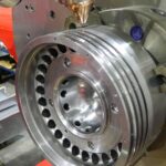 Fully rebuilt piston crown after laser cladding and final machining at KIMI