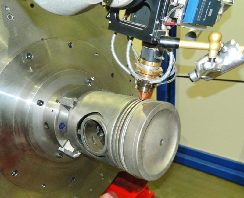 Laser cladding restoring the top ring groove of a 4-stroke piston crown at KIMI’s precision workshop.