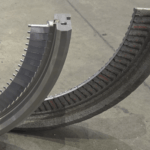 Before-and-after comparison of a steam turbine stationary blade stage restored through reverse engineering.